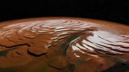 NASA показало новогодние снимки Марса с сугробами