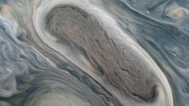 В NASA выложили завораживающие снимки Юпитера и звуки его спутника в стиле R2-D2